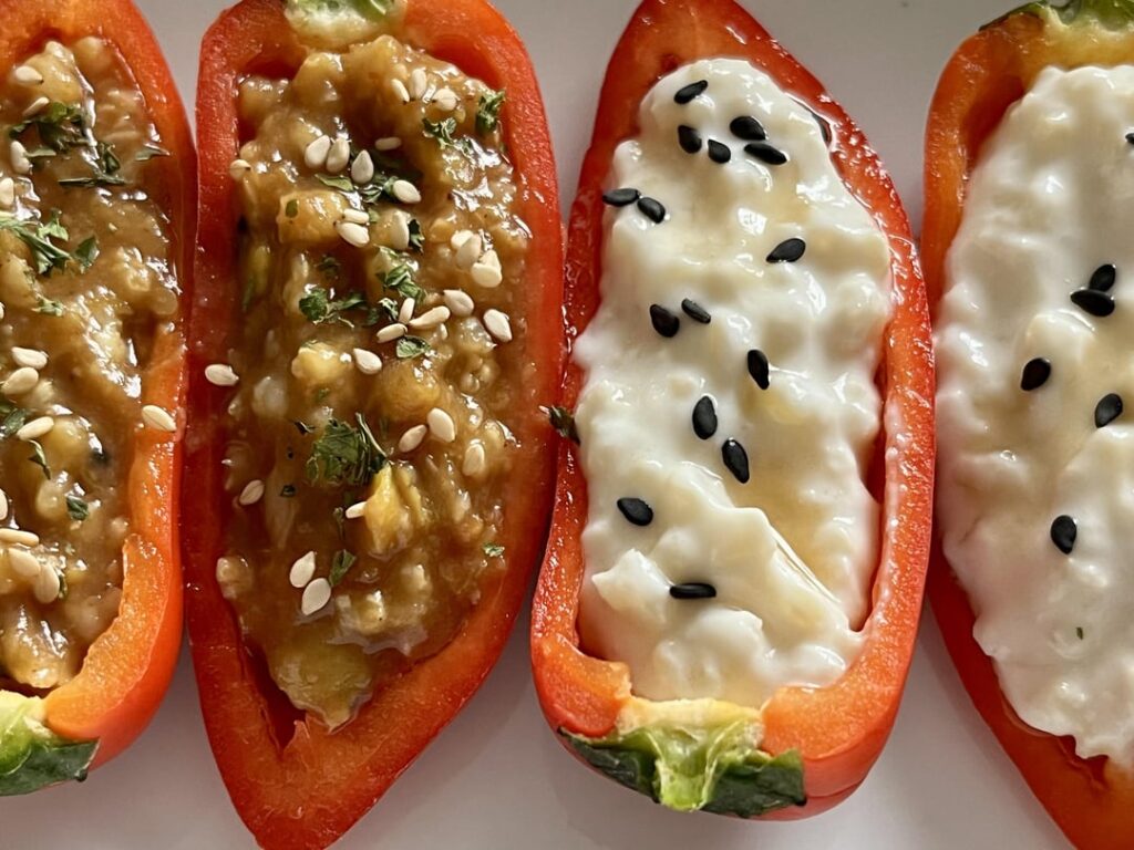 Sweet and savory versions of millet-stuffed peppers. In both varieties, whole-grain millet is the common base.