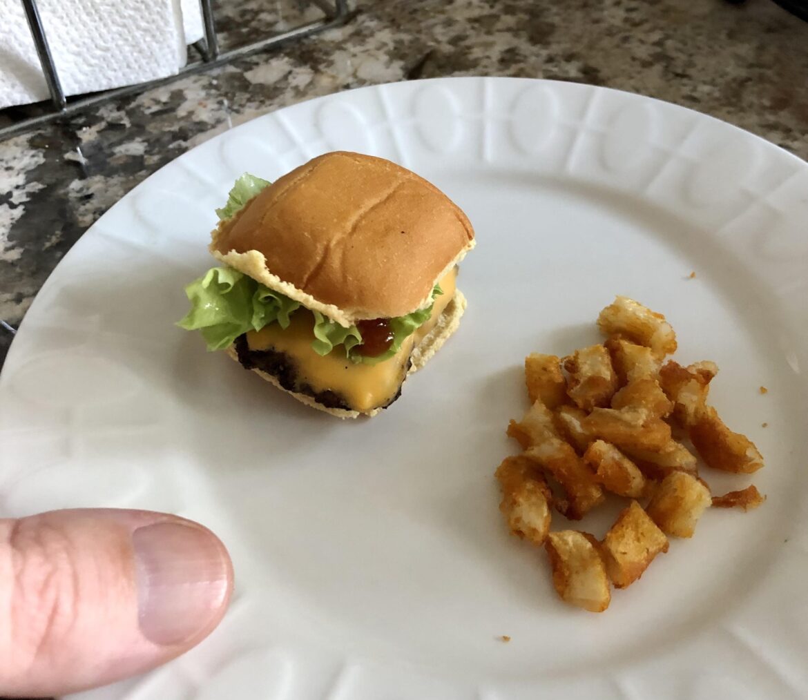 My 1 year old sons first cheeseburger and fries