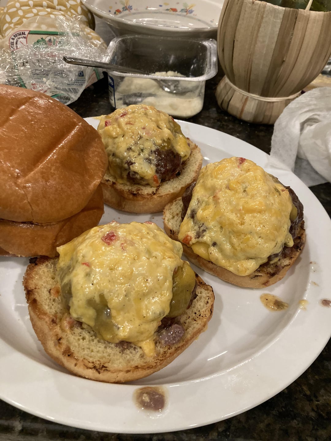 Smoked burgers with American cheese and Jalapeño Pimento Cheese on