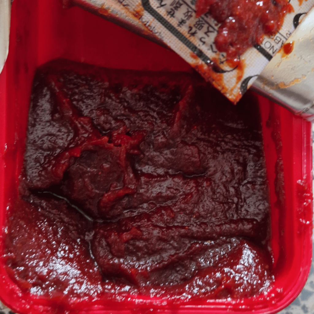 Does this gochujang look good? Its been in the fridge for I guess a year. The expiry date is in September this year but it's opened so Im not sure