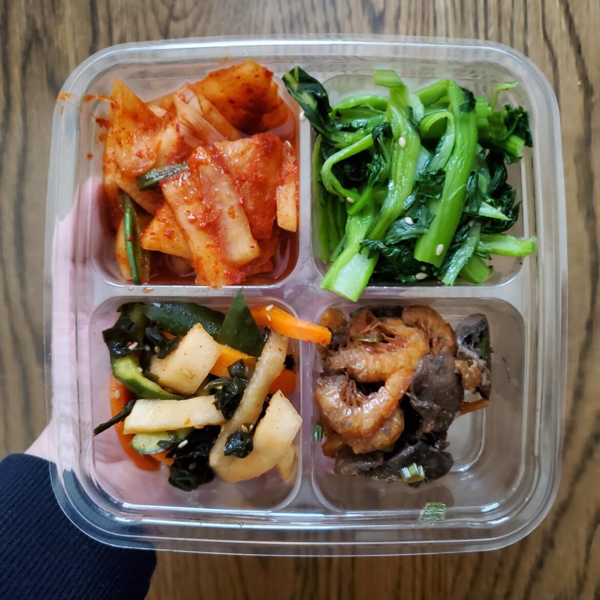 Got this banchan with my take out order. Trying to identify and recreate the leafy greens in the upper left - looking for tips or recipes