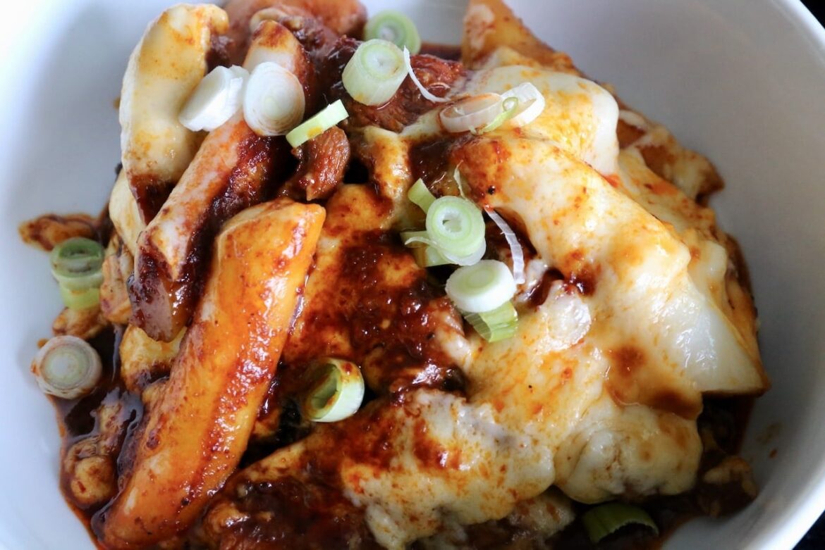 Korean Spicy Gochujang Chicken with Tteokbokki Rice Cakes and Melted Mozzarella Cheese