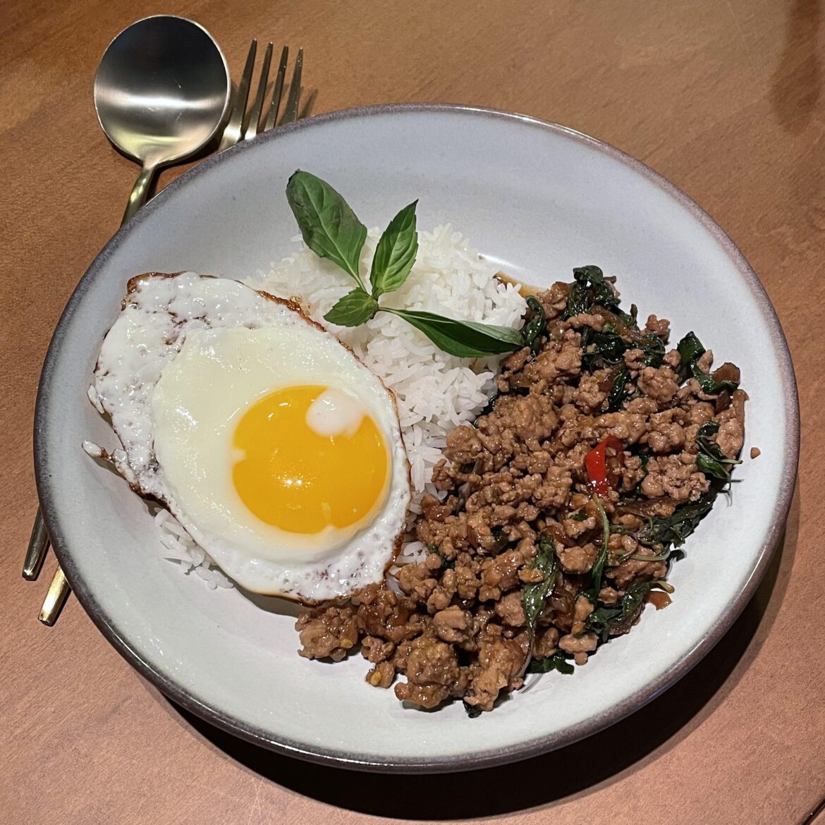Pad kra pao / Thai basil pork. Somehow nearly forgot the egg on this one. Would’ve been a shame!