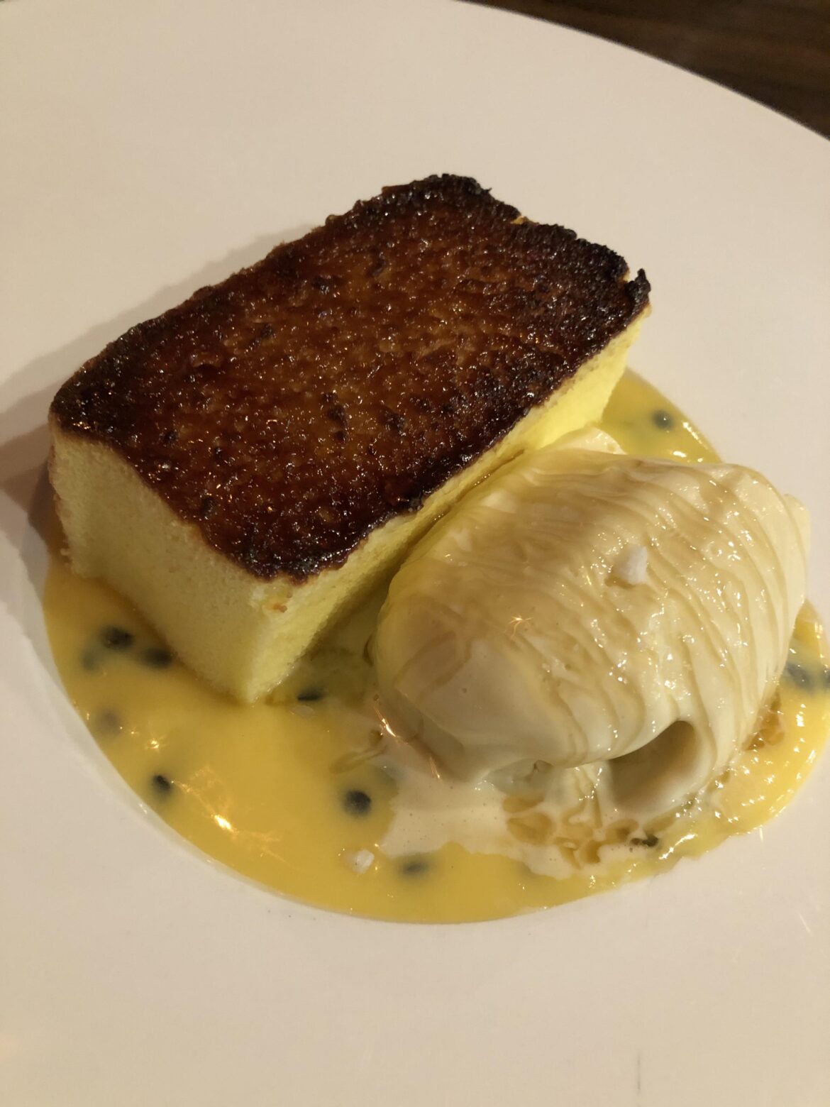 Flowers Of Vietnam: Japanese cheesecake with coconut ice cream and passion fruit curd.