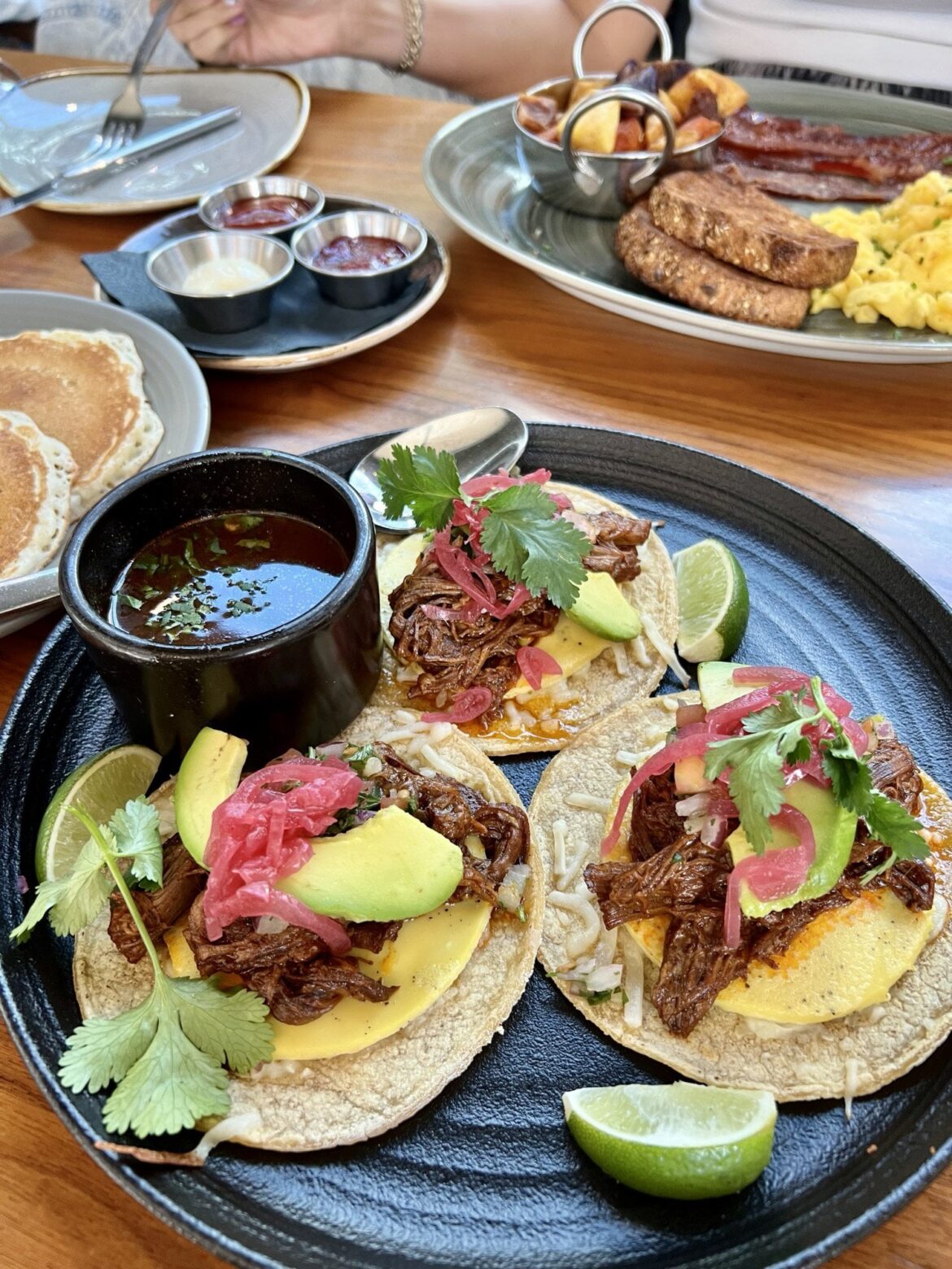 Wagyu birria brisket breakfast tacos ($18) at Granville