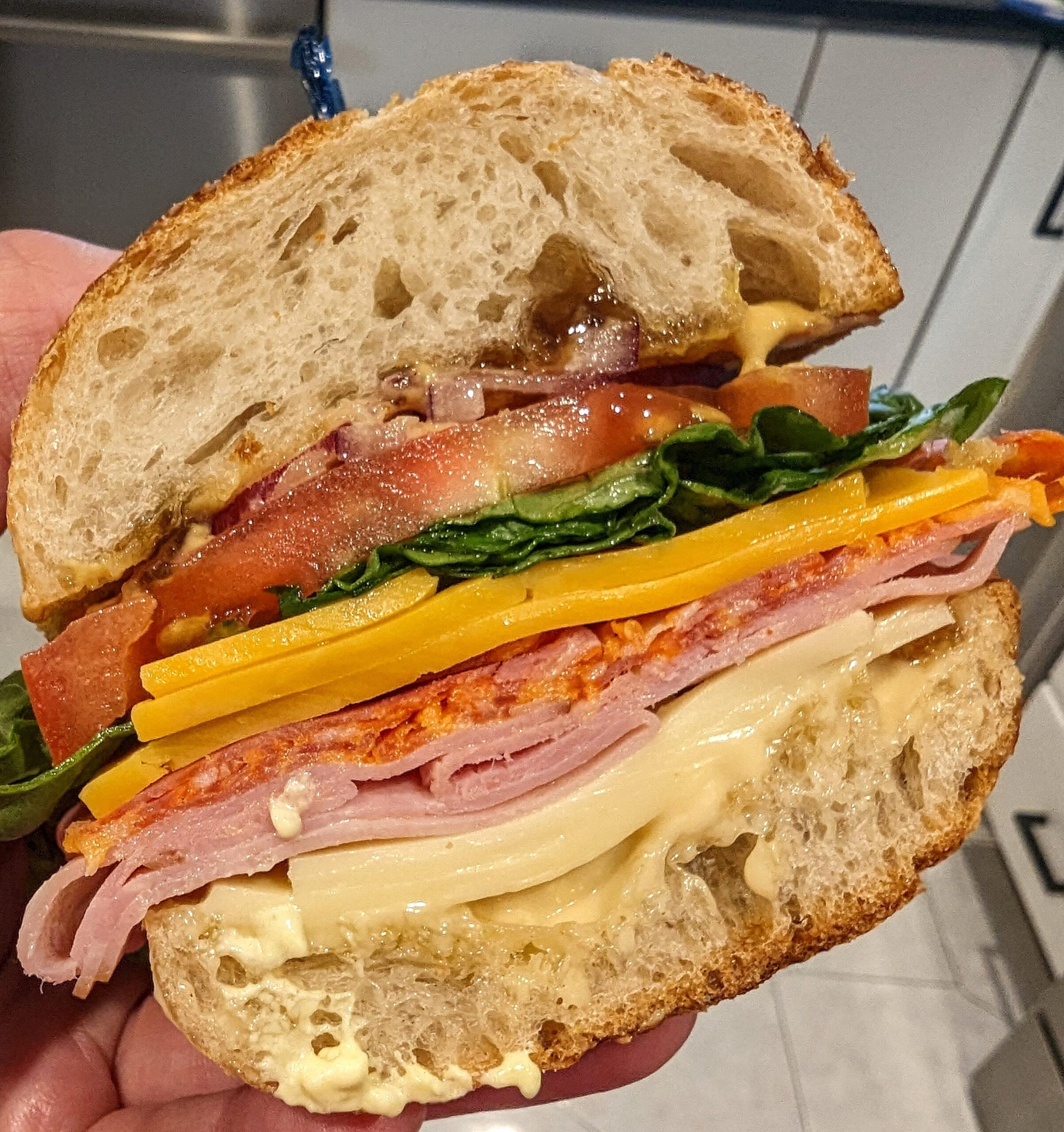 Garlic aioli, LoL American, smoked ham, hot capicola, sharp yellow