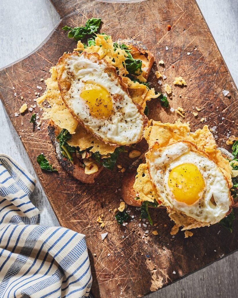 Parmesan Frico Eggs with Greens on Toast