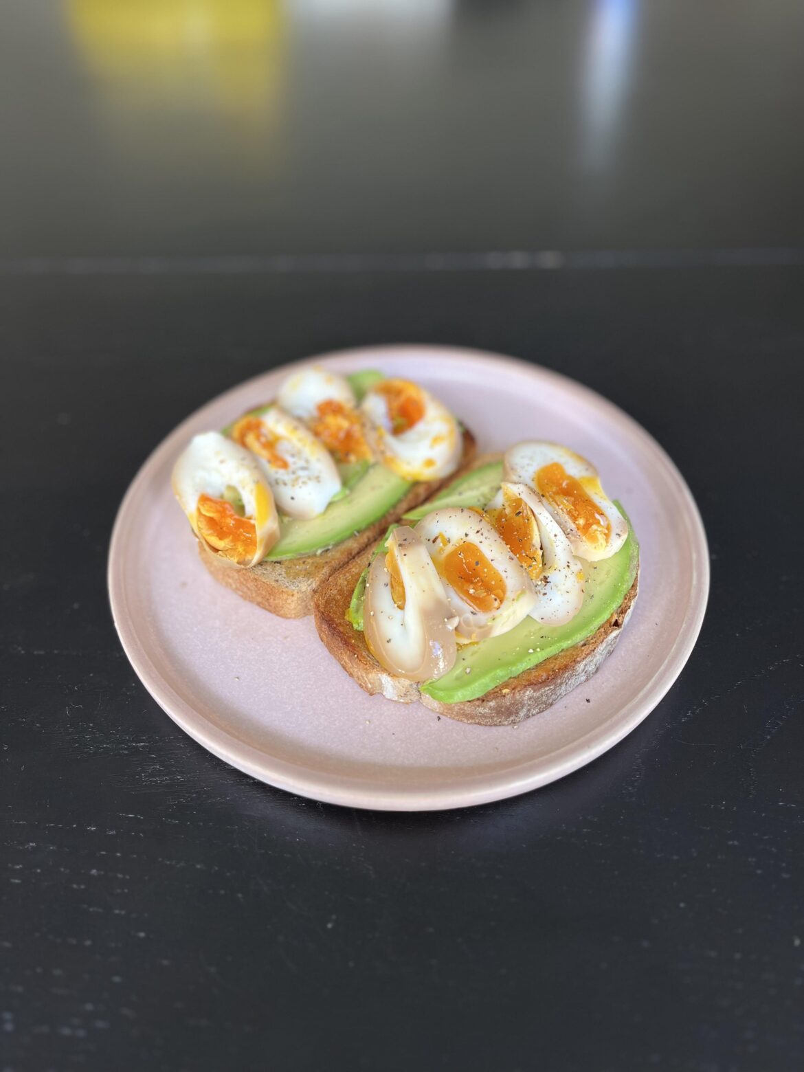 [i made] avo toast on light rye with ramen egg on it