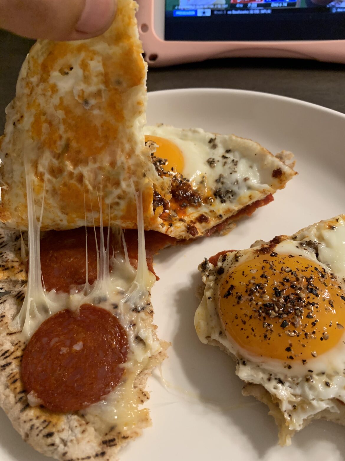 Naan w/ pep and cheese garnished with egg