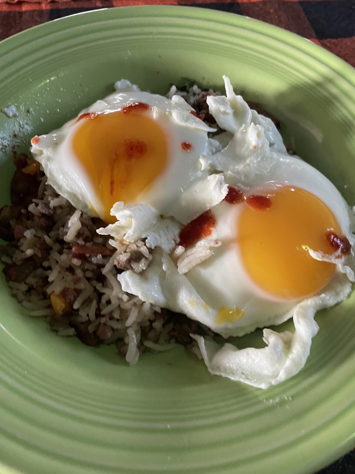 Venison from deer I harvested and andouille dirty rice with home grown sunny sides.