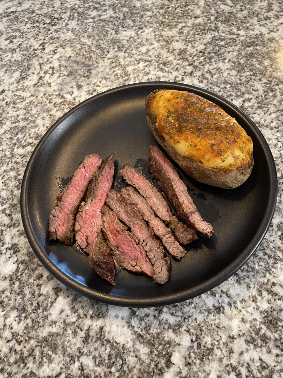 “Ugly” steak + cheddar twice baked potato