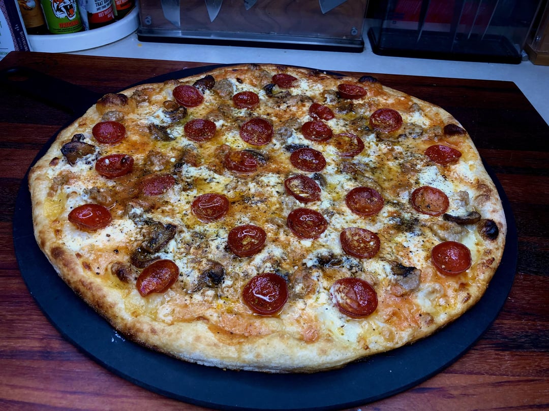 Pizza night! Three cheeses, with a mix of my red sauce and Pecorino cream sauce, sweet Italian