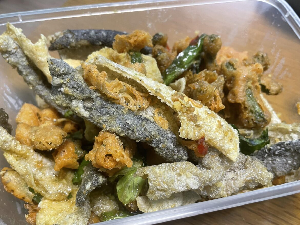 Crispy fish skin, fried water spinach and baby anchovies - actually delicious!