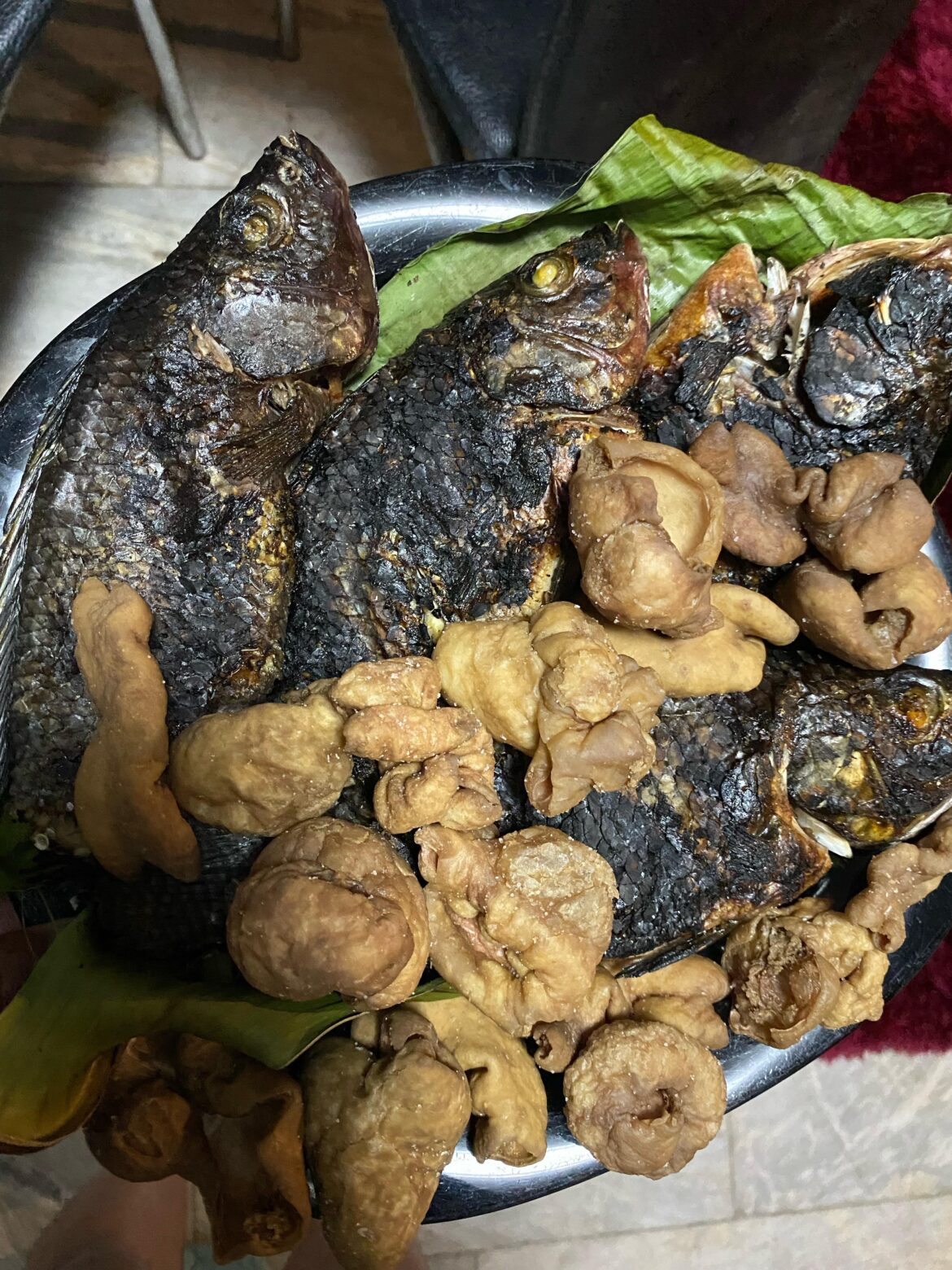 PULUTAN only in the Philippines Inihaw na Tilapia and Some Chicharon Bulaklak