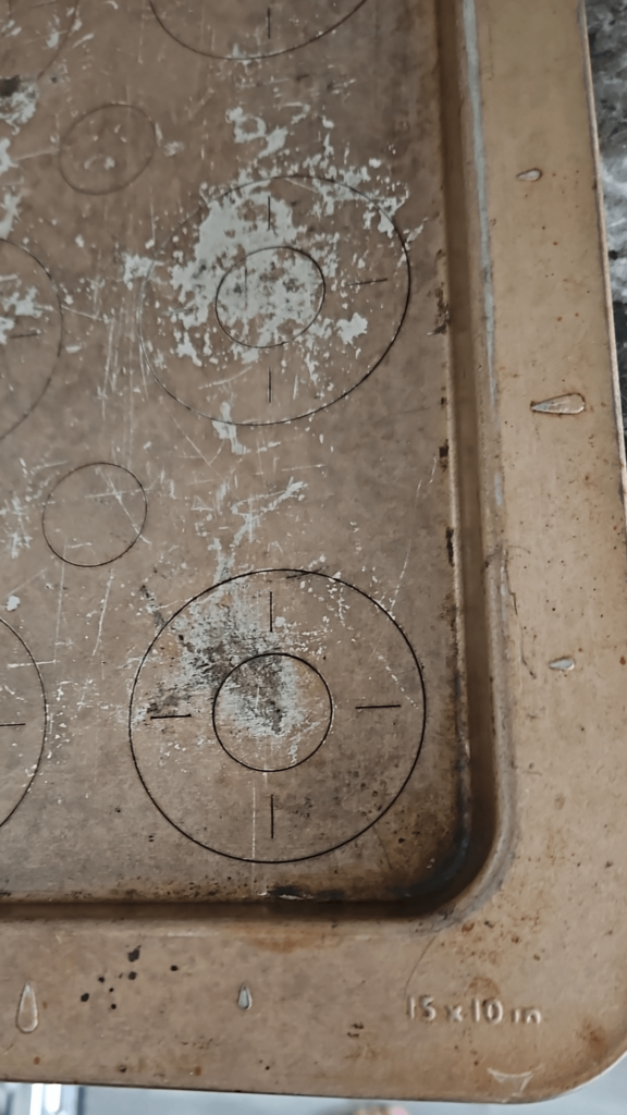 Anyone know where to get another baking sheet with marks like this on the rim?