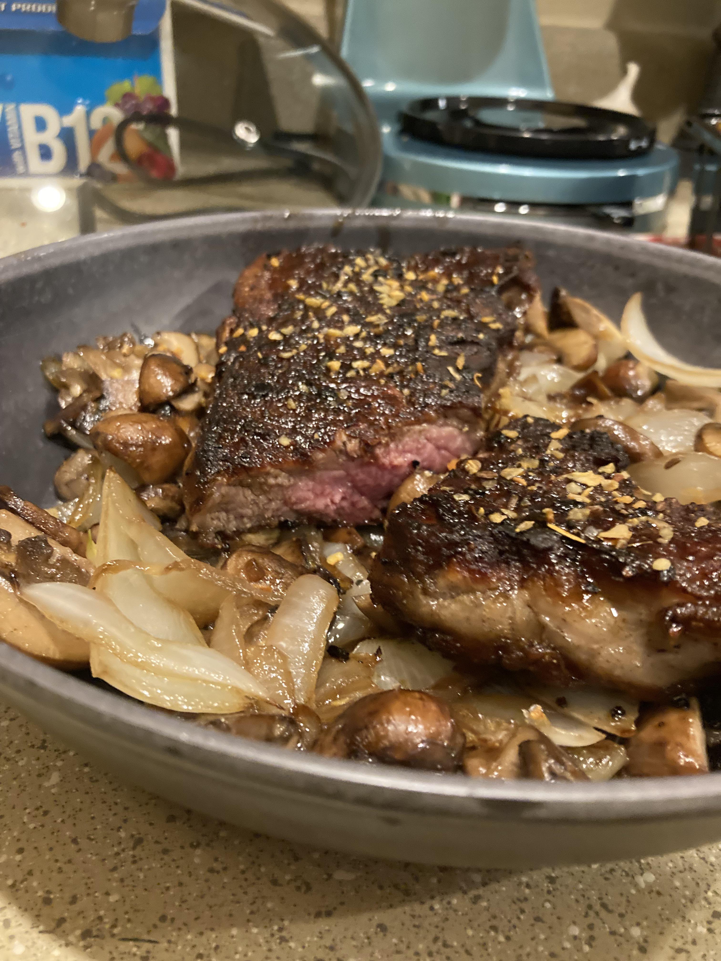Tonights dinner pan fried steak mushrooms and onions. Dining and Cooking