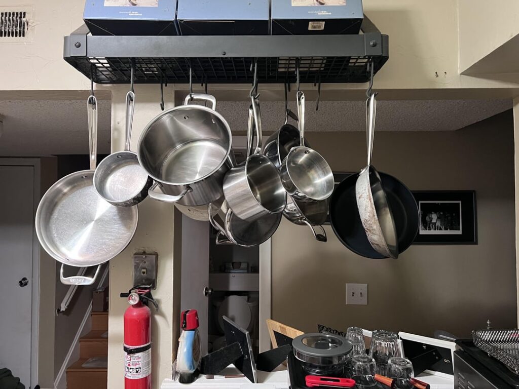 Help Finding Modular Racks or Some Shelving System. I would like to put a modular rack on the base of my cart to lift the toaster oven and hang my pots and pans, freeing up the top. I’ve been looking but I don’t know where to start. I’ve seen similar setups. Does anyone have any ideas?