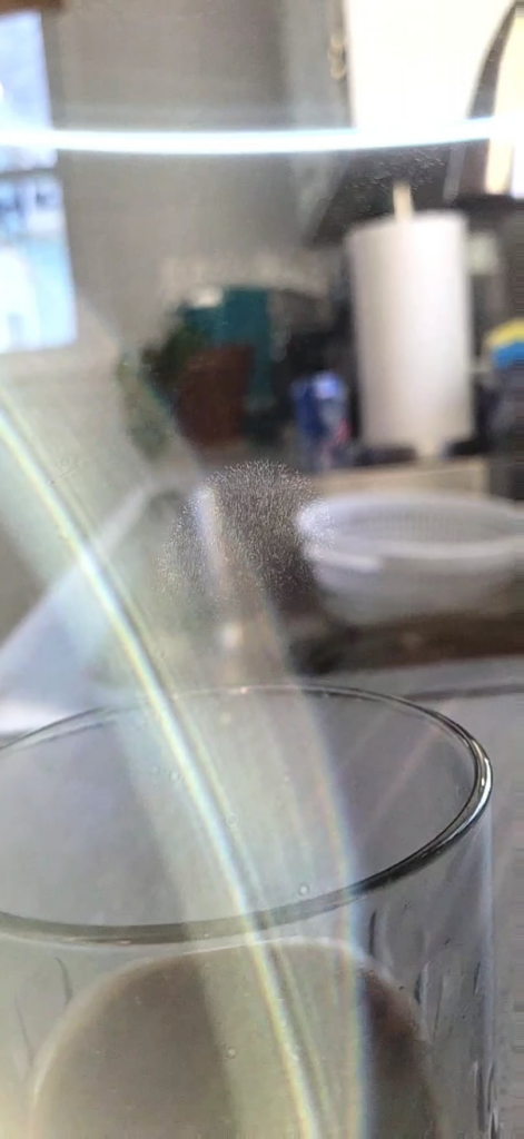 Why does my coffee have particle effect vapor?