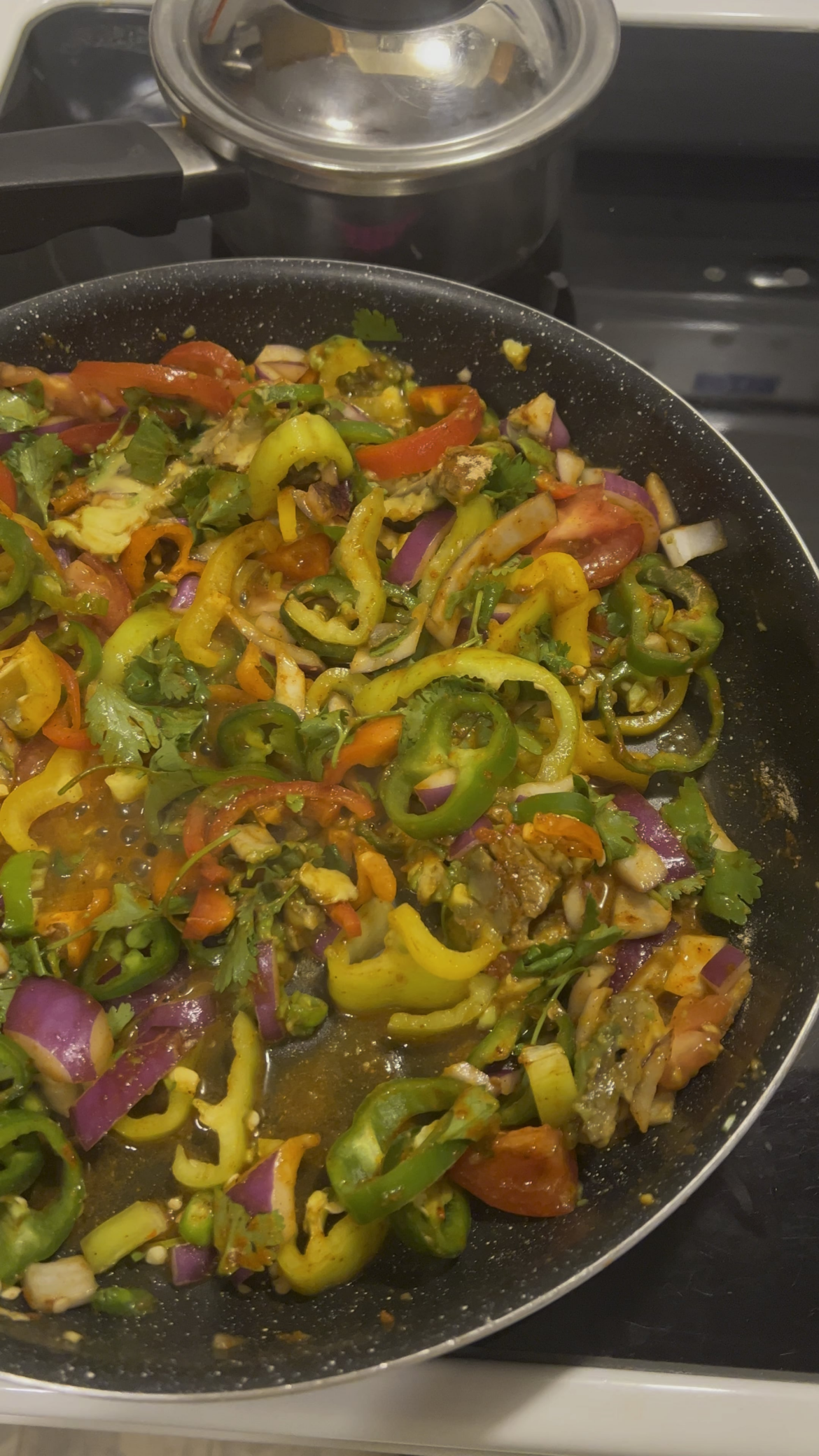 It’s 11 pm and I’m making veggie/sweet potato/black bean burritos(this is all the stuff going in them, in the process of still being seasoned)