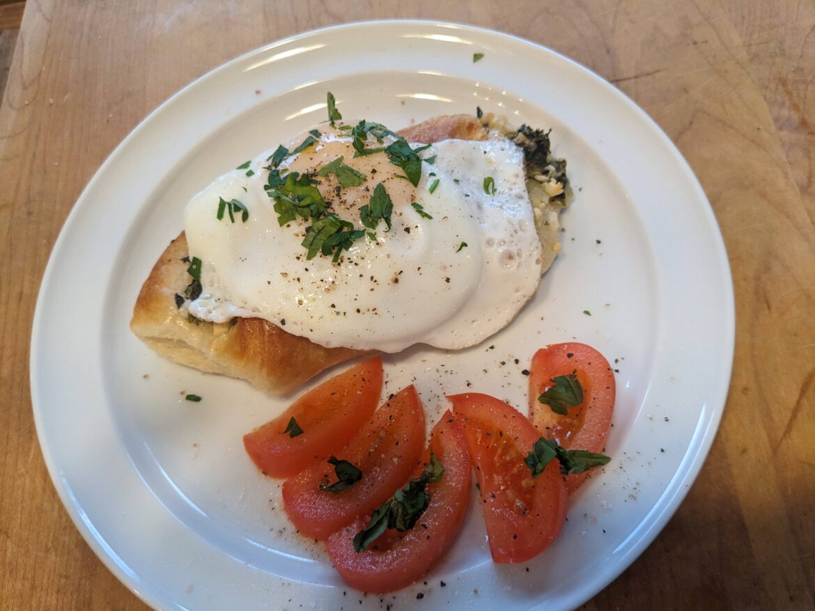 Fried egg on spinach and feta croissant. Was delicious.