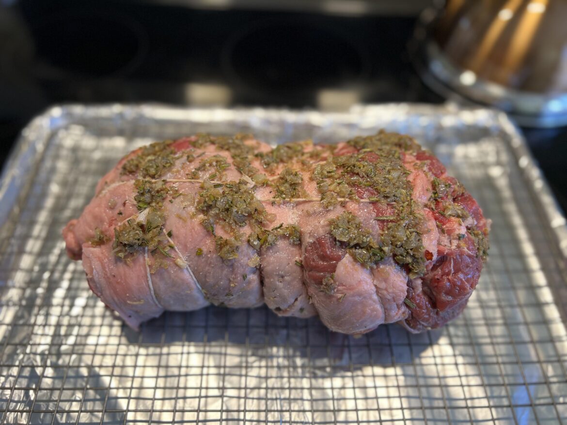 Kenji’s Slow Roasted Leg of Lamb going in the oven.