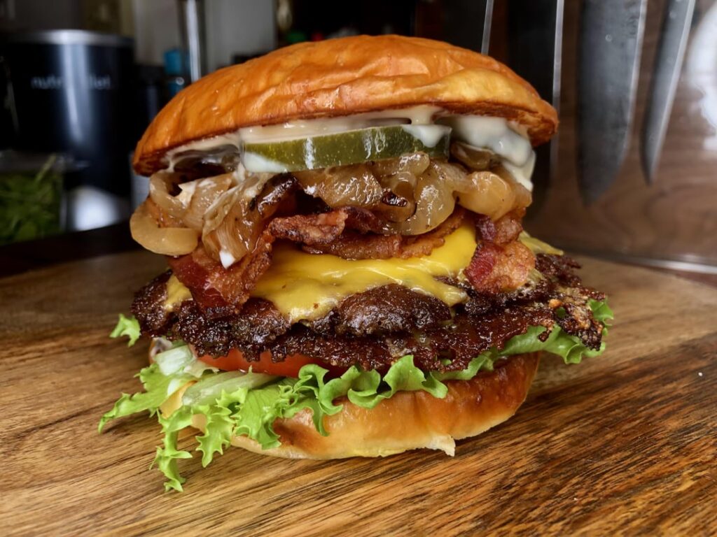 Burger night! This messy beast had two home ground smash patties with American cheese, beef bacon, a pile of grilled onions, lettuce, tomato, dill pickles, and a couple of home made sauces. A burger sauce, and a maple mustard aioli, all on a buttered and grilled homemade milk bread bun.