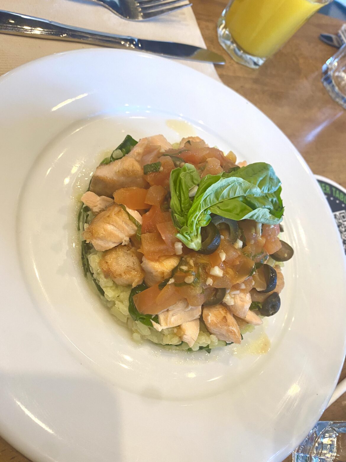 Scottish Atlantic salmon over lemon spinach risotto @ Blu Jam Cafe