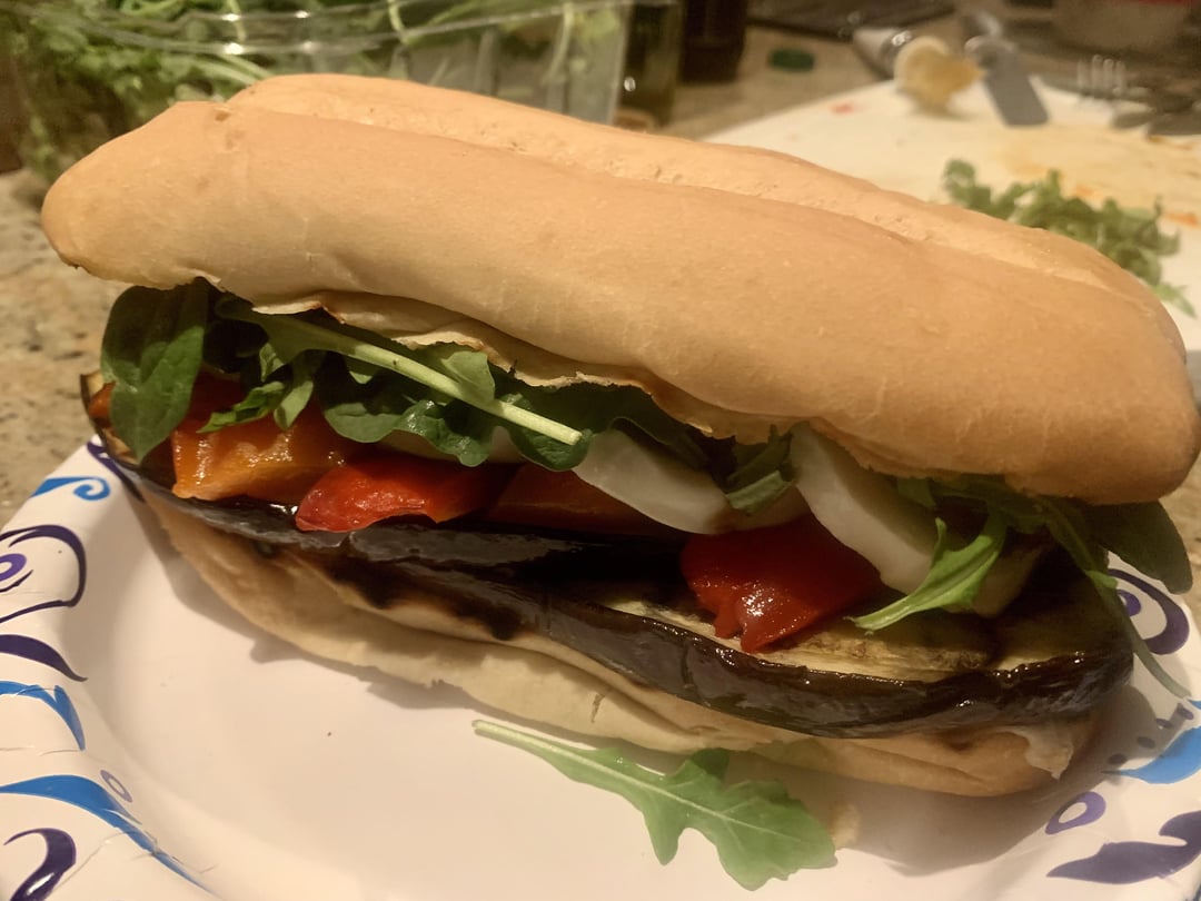 Toasted eggplant and red bell pepper with fresh mozzarella, basil