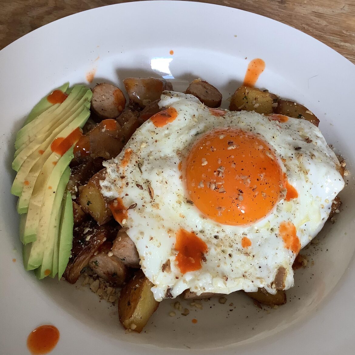 Leftovers: cheesy hash browns & Turkey sausage with Za’atar and Cholula