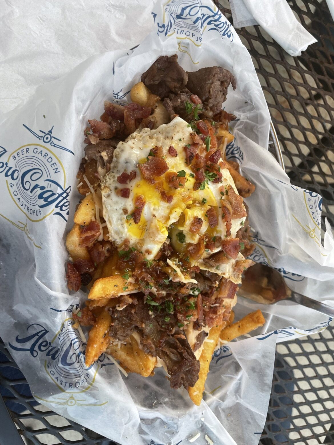 Truffle Fries from my favorite bar. I always have them put an egg on them.