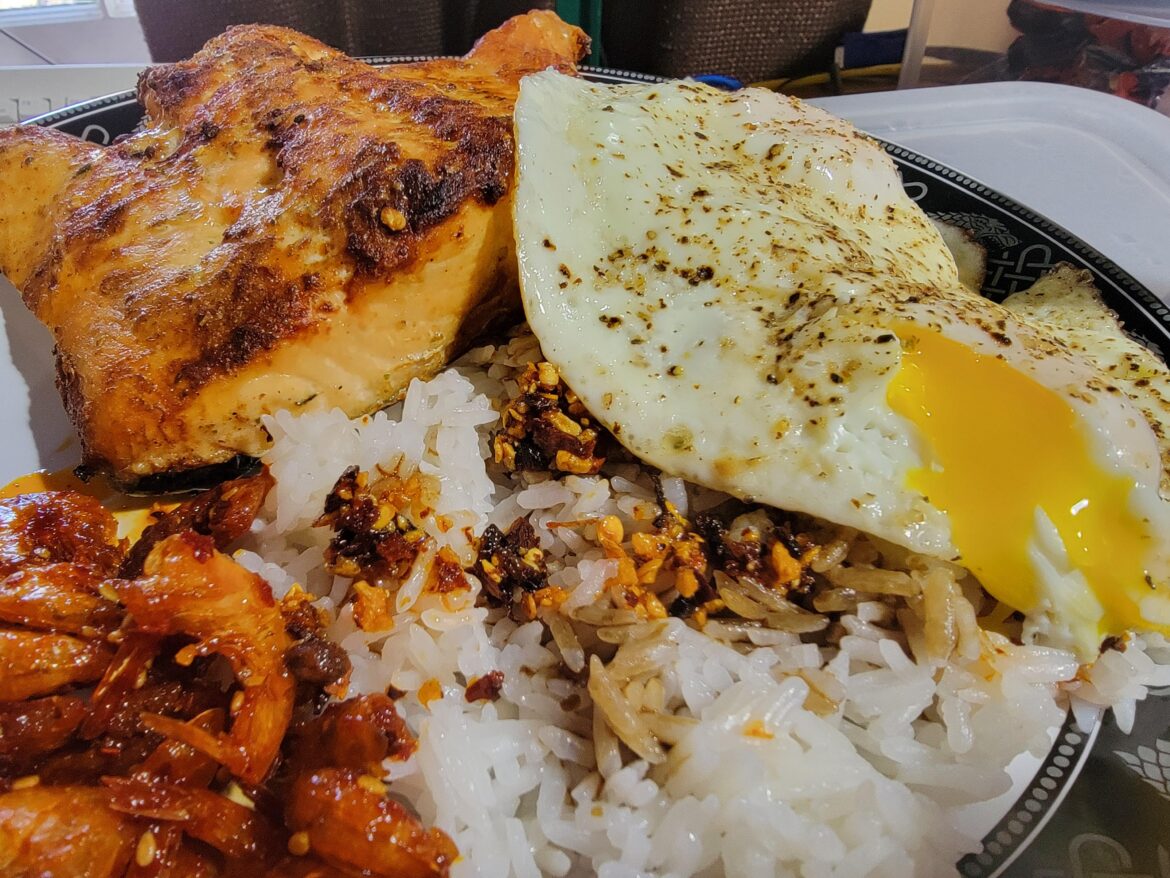 Salmon and eggs over rice.