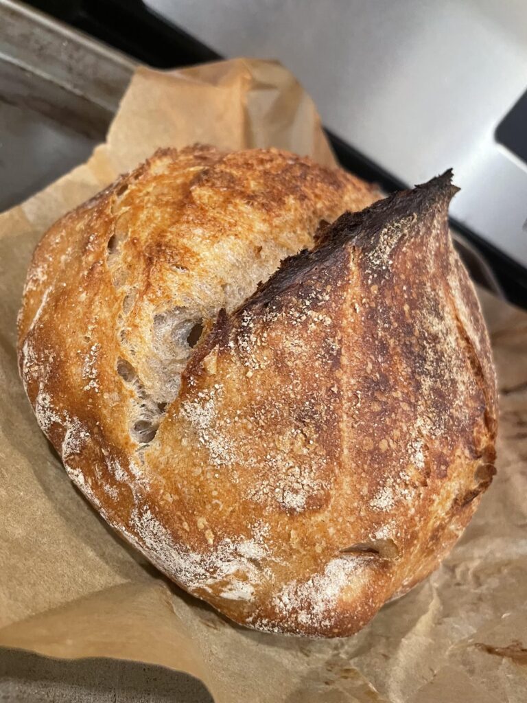 What do you all think of this loaf? Probably my 4th attempt with using my banneton and shaping like this. This one got me the best spring and is my best loaf yet imo. I want a tighter crumb. Any tips are welcome. I assume better shaping would help most.