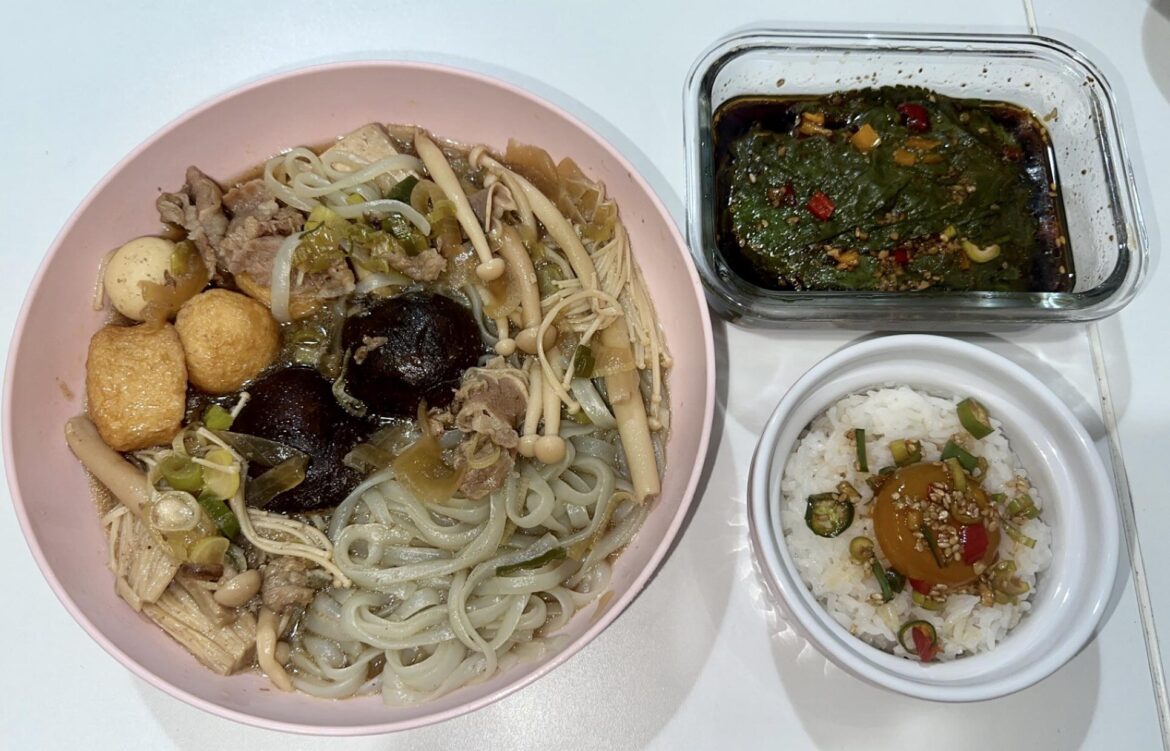 Beef sukiyaki, marinated perilla leaves, and a soy cured egg yolk on my rice