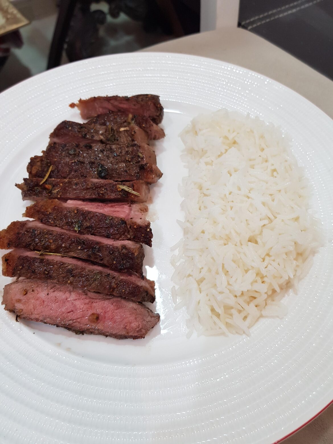 Steak with white rice.