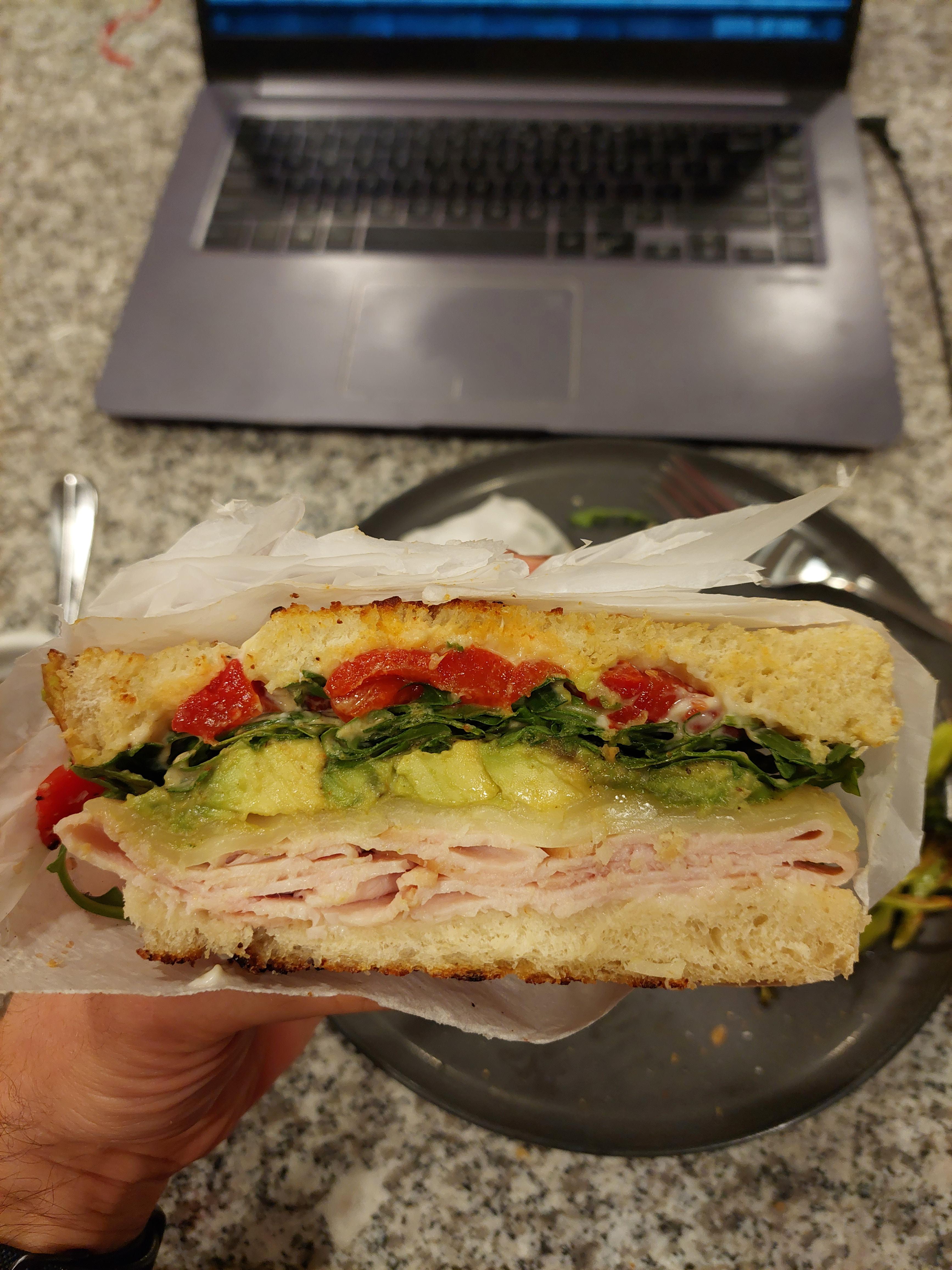 Turkey, provolone, avocado, arugula, roasted red pepper, mayo, mustard
