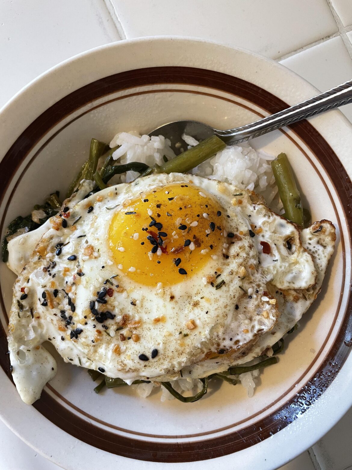 Trader Joe’s Umami & EBTB seasonings on egg and Thai spinach