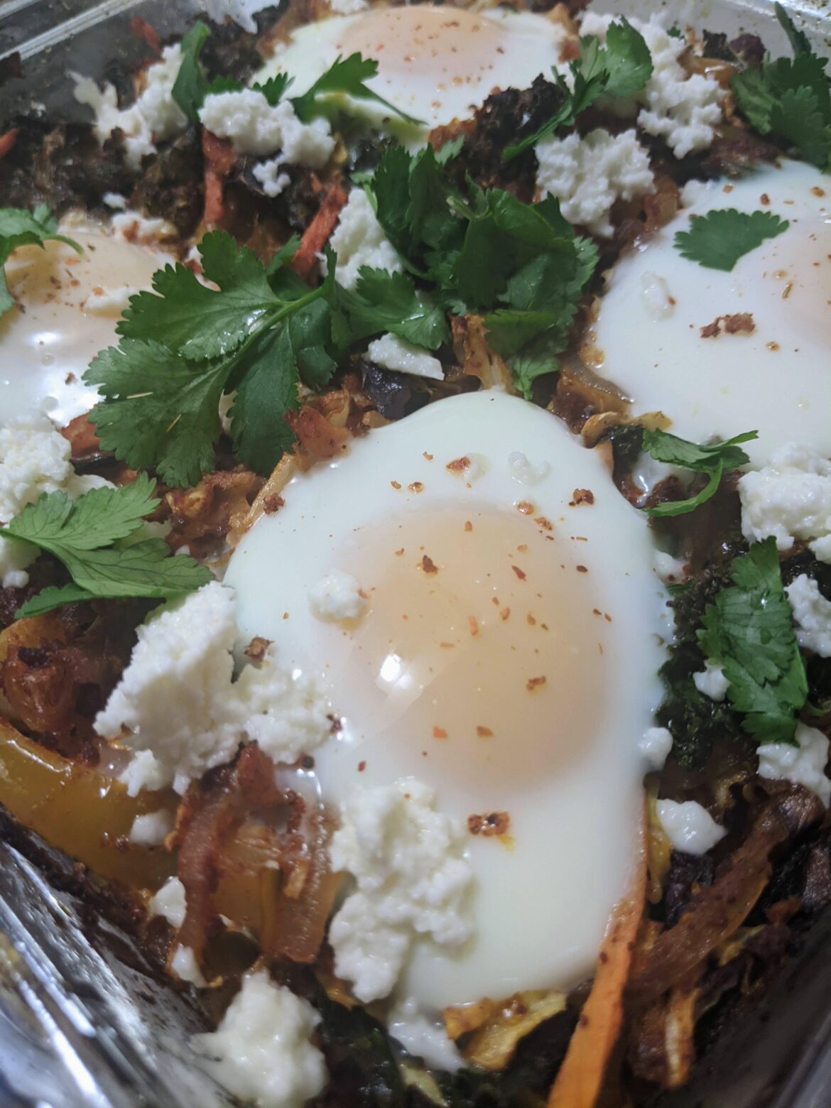 Vegetables cooked with chorizo, topped with eggs, herbs & queso fresco
