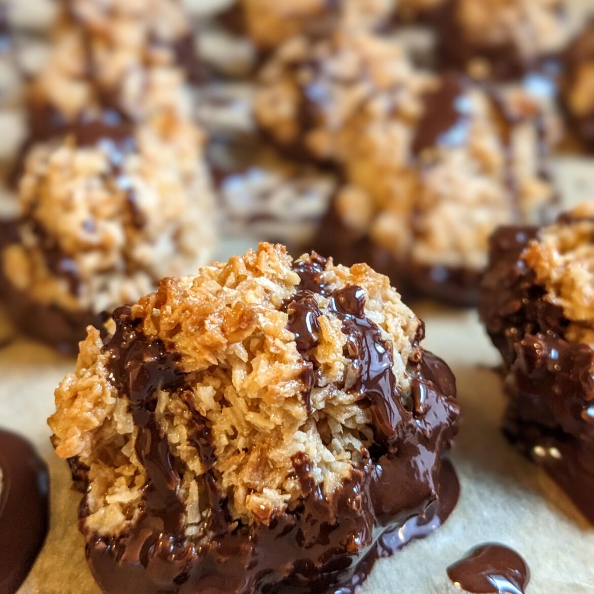 Chocolate dipped dulce de leche macaroons