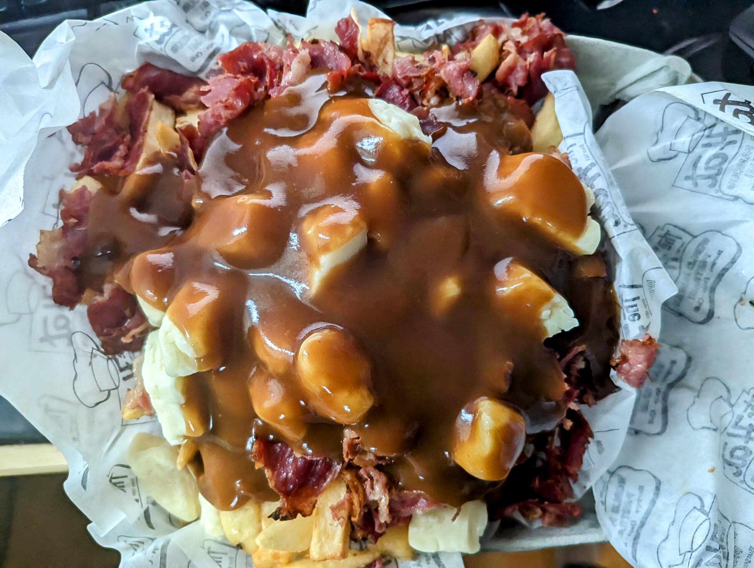 I added cheese curd on pastrami wet fries from The Hat to make poutine