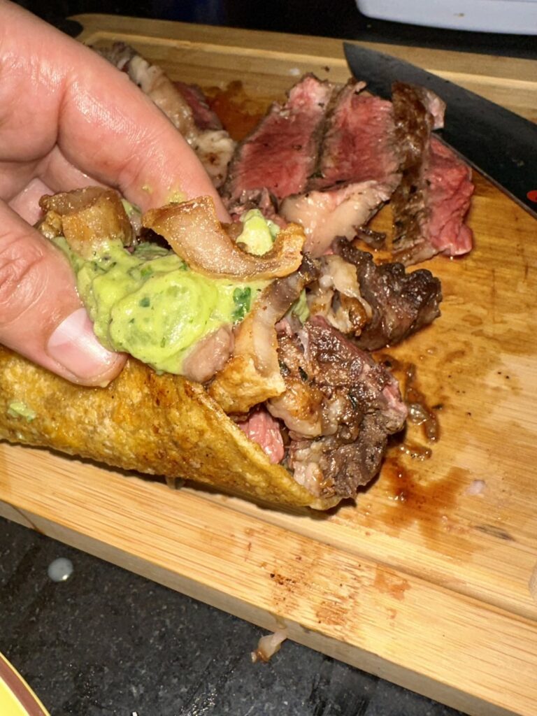 Ribeye tacos with salsa verde, pork belly and bone marrow.
