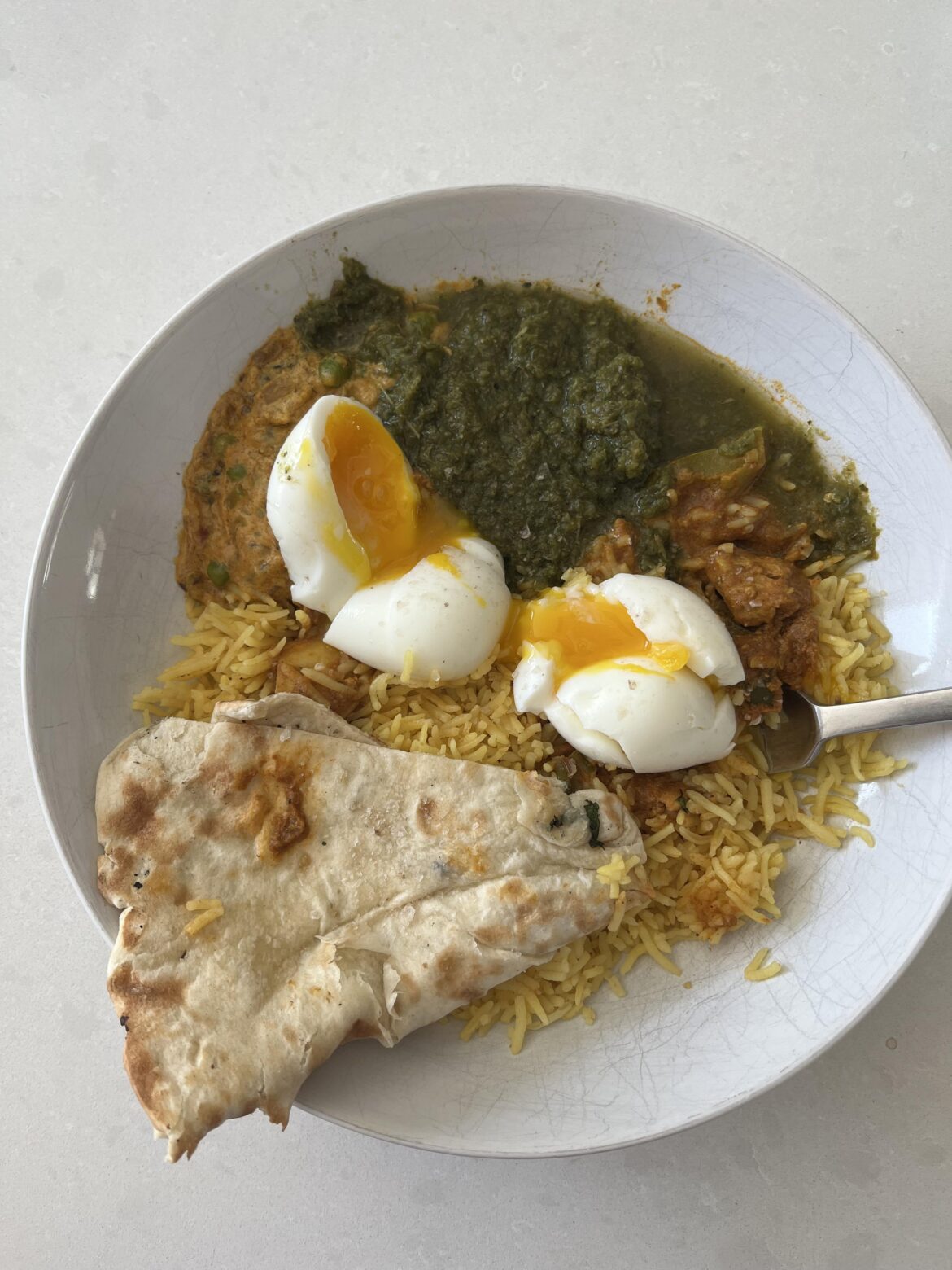 Double eggos on leftover Indian food featuring an extra helping of mint chutney