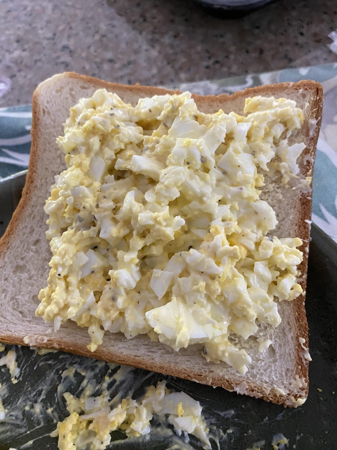 Hardboiled with mayo, salt and pepper ON bread! Comfort food!