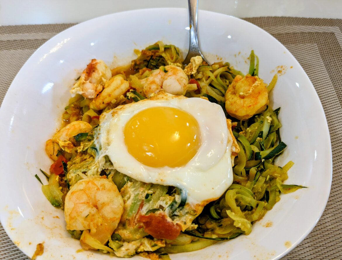Egg on shrimp and shakshuka zoodles