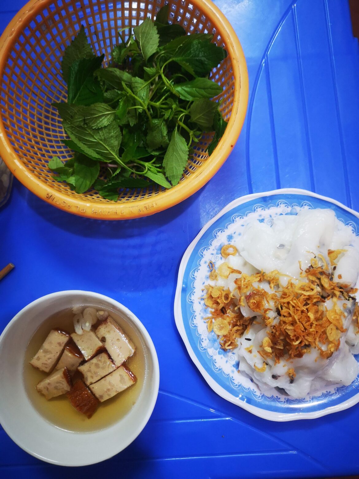 Bánh cuốn FTW. These insanely thin steamed rice rolls are stuffed with mushroom + pork and topped with glorious fried onions.