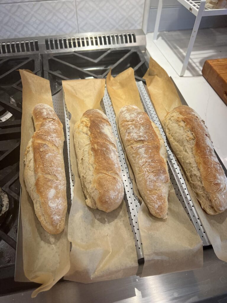 Tried making baguettes, they turned onto bread logs LOL. Need some more shaping/scoring practice!