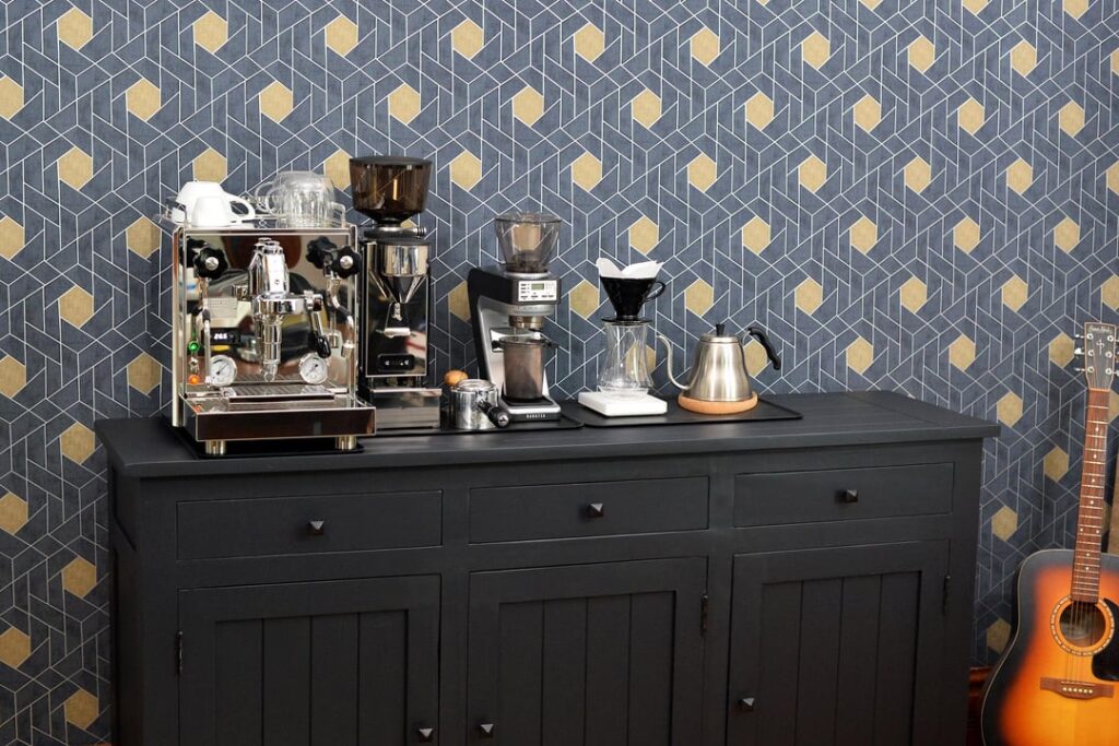 I decided that my coffee station needed a refresh. New wallpaper, and painted an old cabinet.