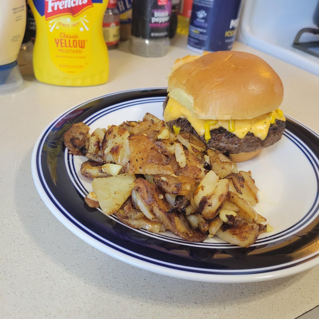 Cheeseburger with garlic and onion fries Dining and Cooking