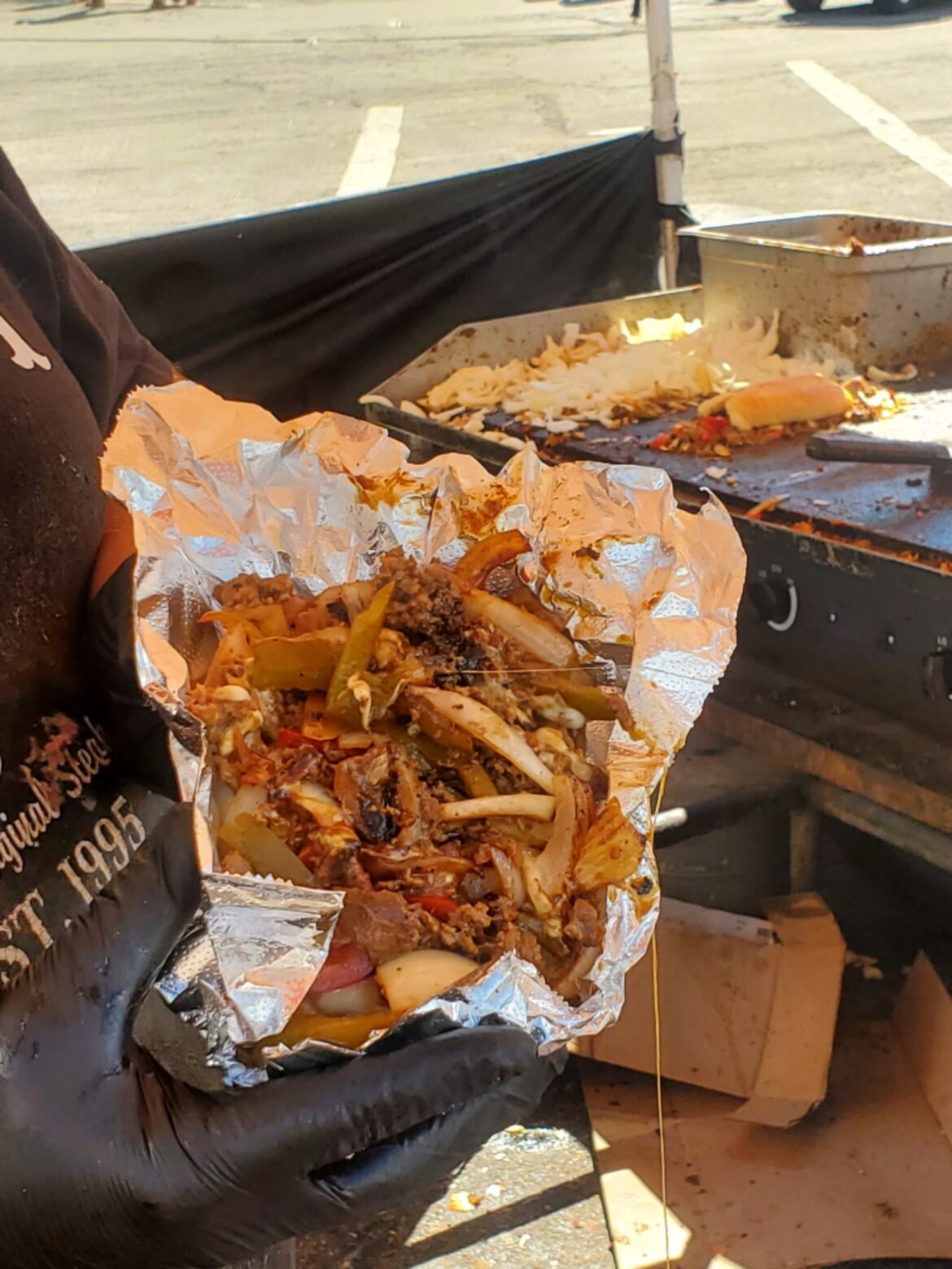 A steak and vegetable medley on a roll. It was at a Summer festival today, was let down to learn Guy Fieri wasn't going to make a cameo.
