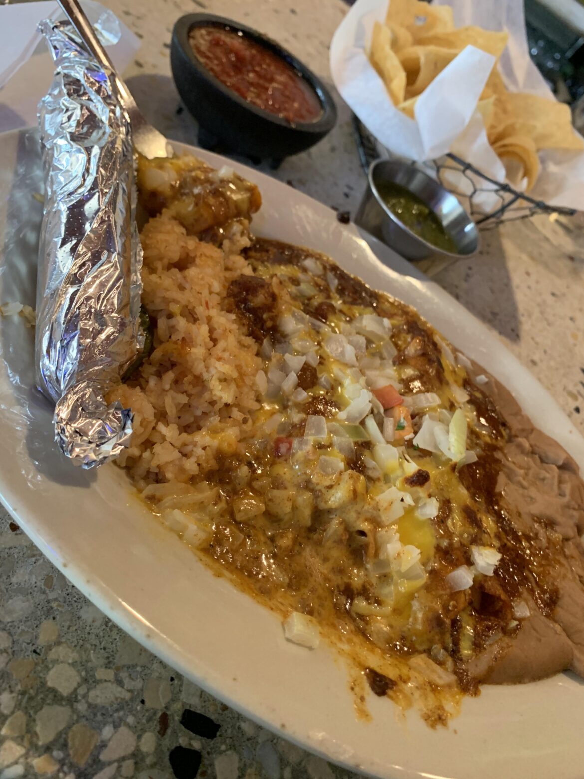 Enchiladas are tacos, right? Mexican lunch plate @Maudies extra onions.