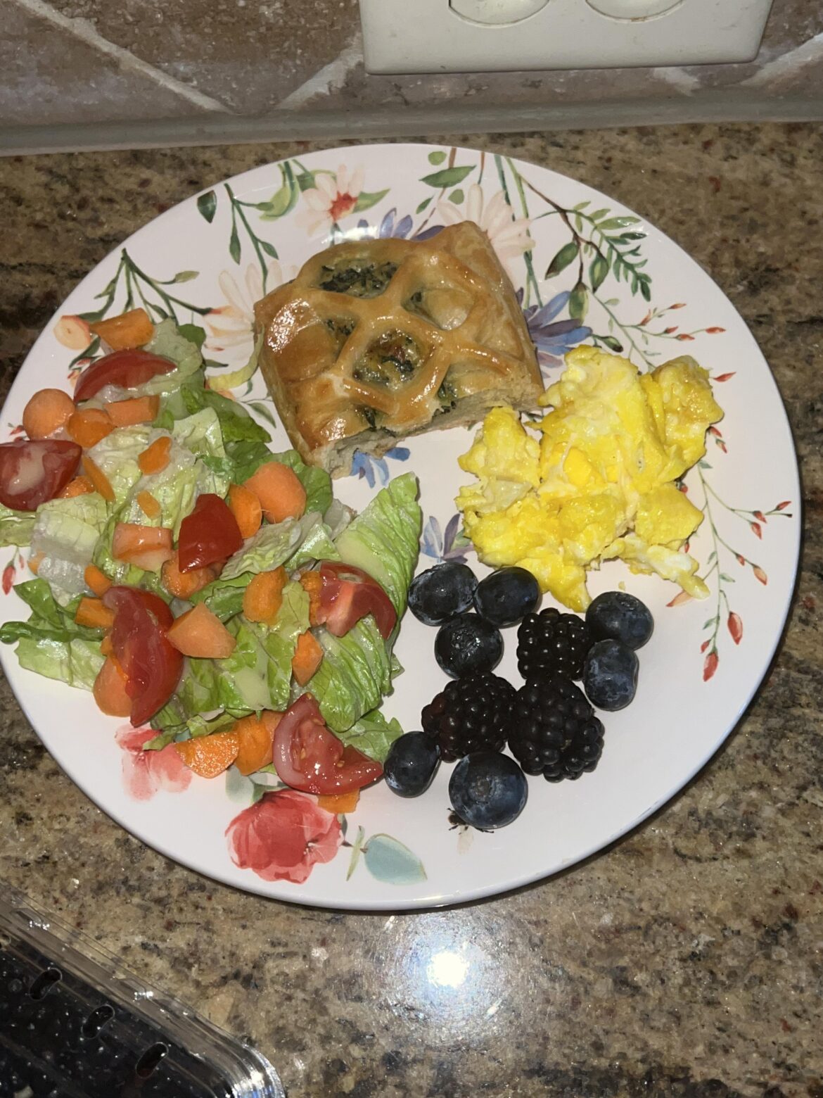 Cozy spinach puff pastry with eggs, blueberries, blackberries, and a side salad!